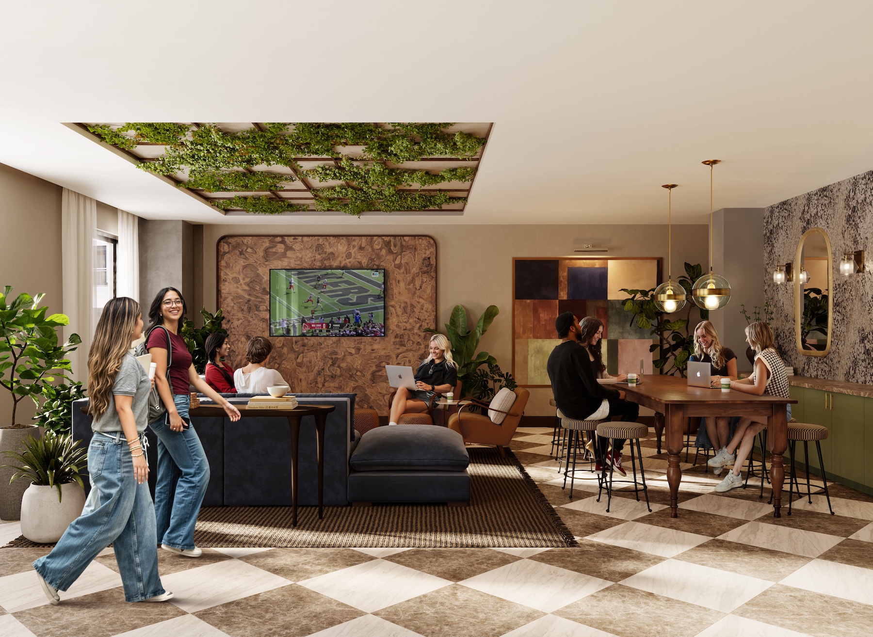 A modern lounge for Purdue off campus housing, with people socializing, working on laptops, and watching a football game on a wall-mounted TV. The space includes plants, a patterned floor, and comfortable seating with tables.