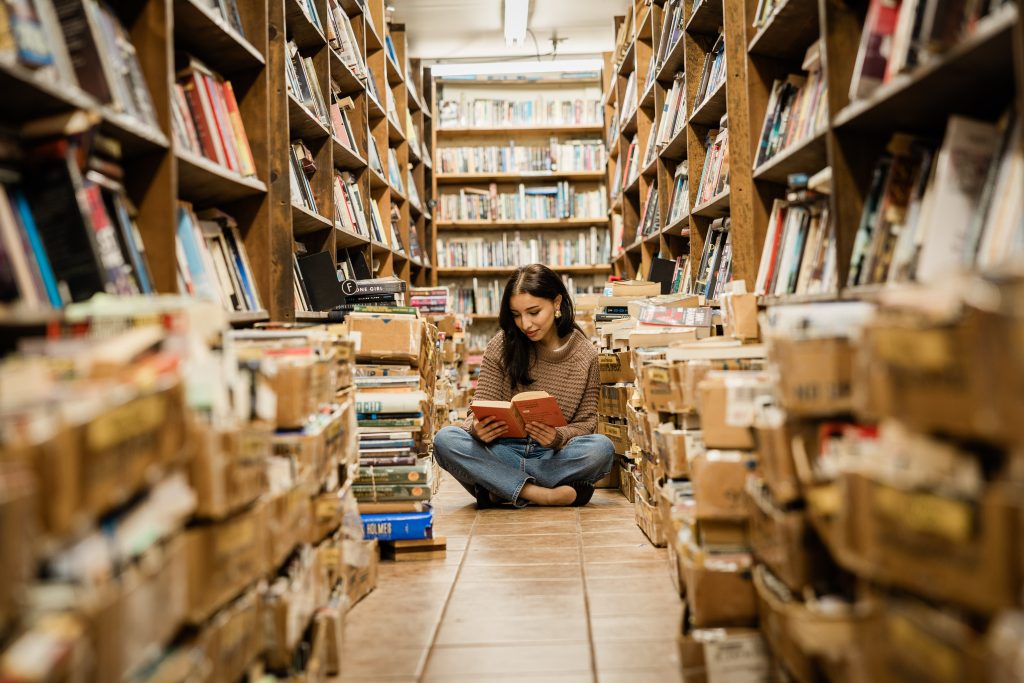 A Purdue student studies in the library on campus in West Lafayette.