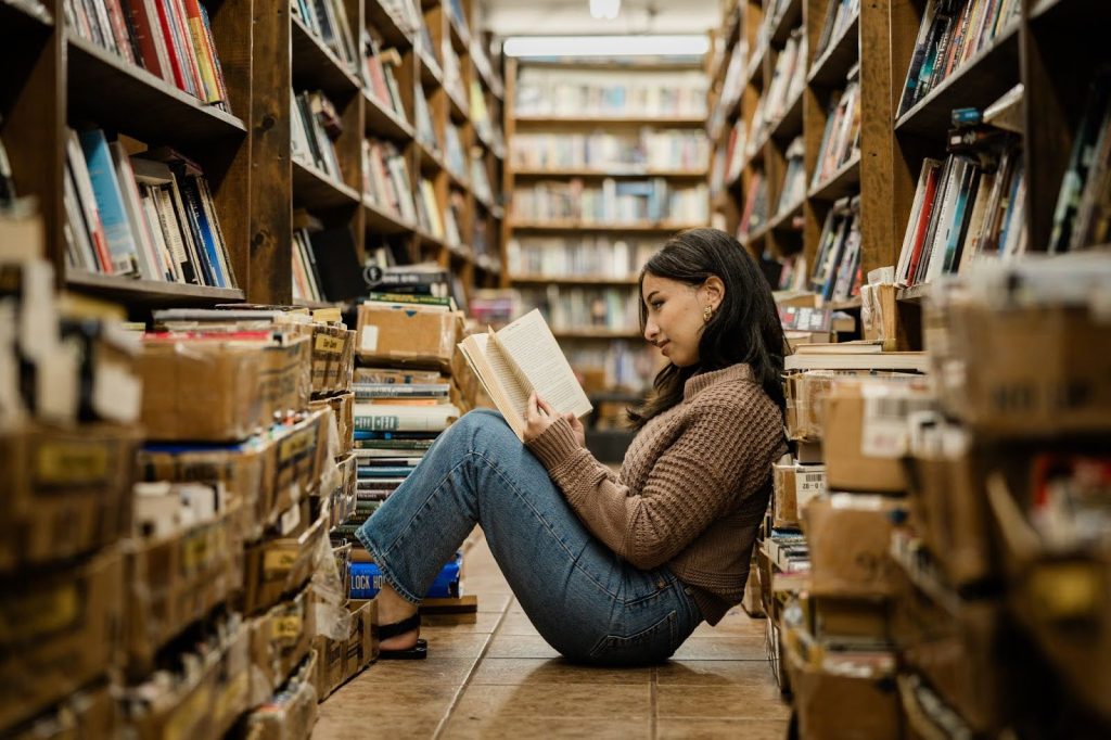 A student reads in the Purdue library on campus.
