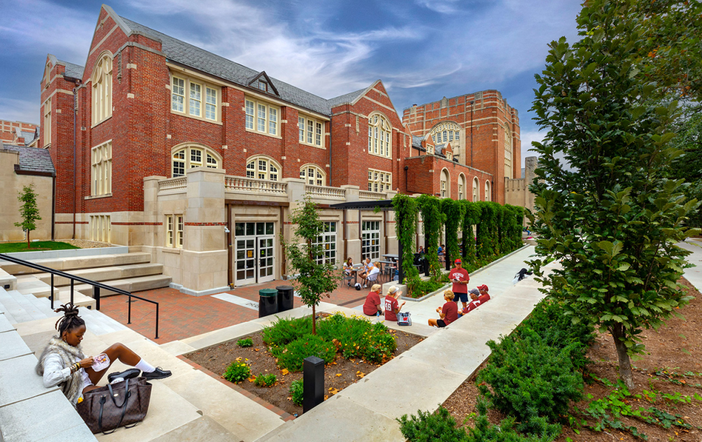 Exterior rendering of Purdue Memorial Union, featuring students outside.