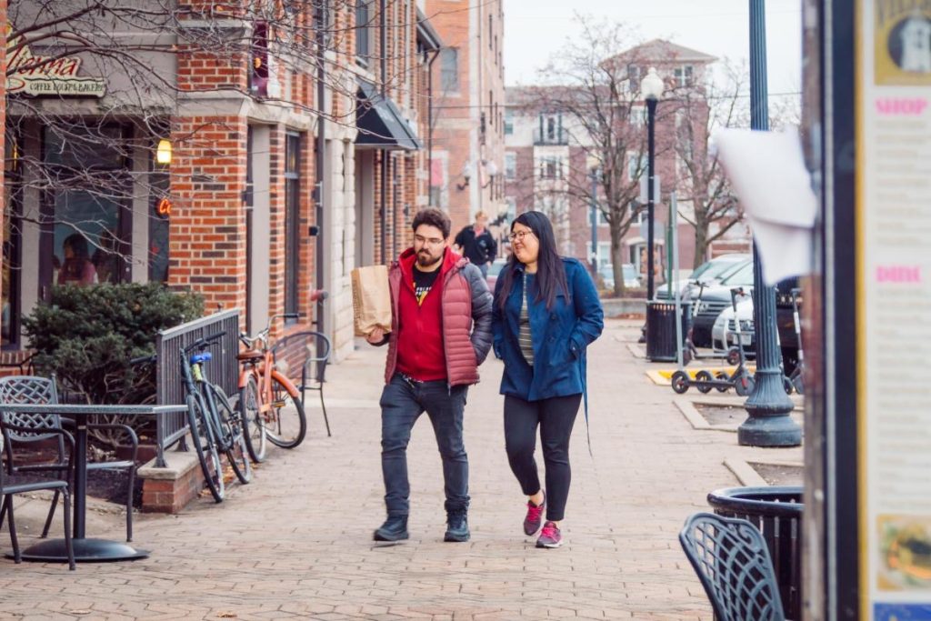 People walking in downtown Chauncey Village in West Lafayette near Purdue’s campus.