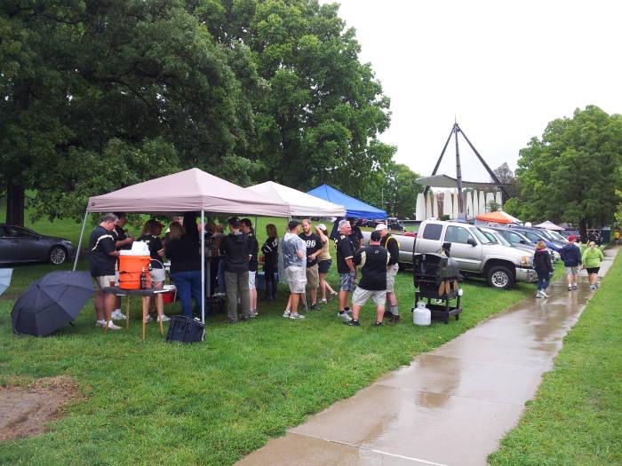 Image of West Slayter Hill and some tents set up to tailgate for a Purdue football game.
