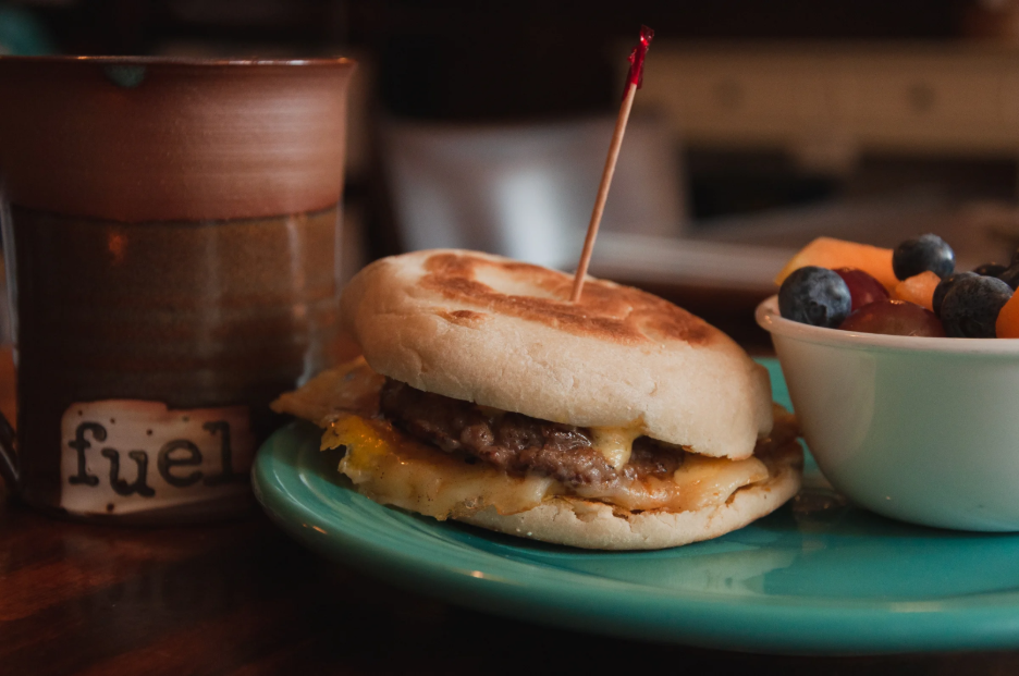 An egg sandwich and fresh fruit from Fuel Coffee Shop. 