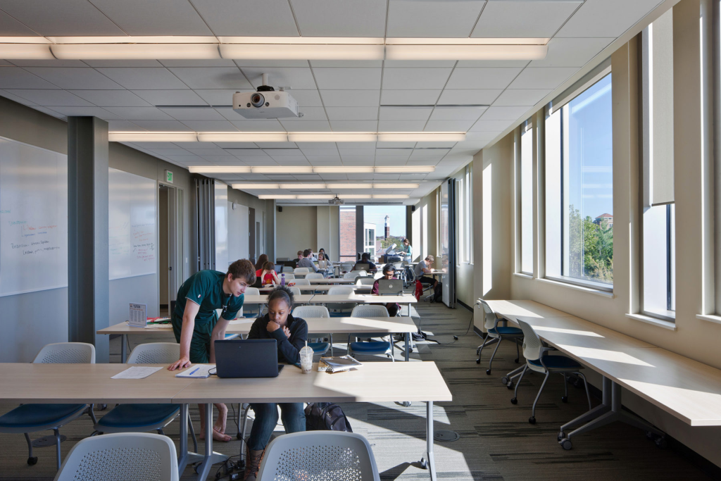 Interior view of Krach Leadership Center featuring students studying. 