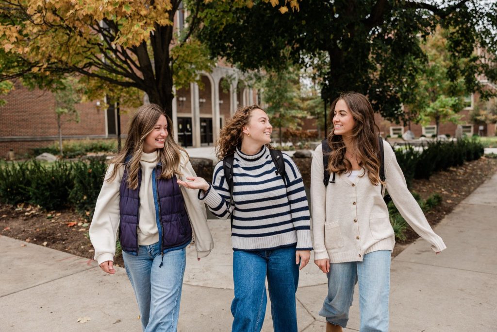 Three Purdue students walking together on Purdue’s campus.